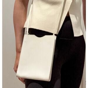 HERMÈS White Crossbody Bag Pochette Onimetu Leather Shoulder Onimaitou Hermes